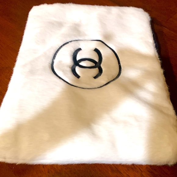 CHANEL Accessories - Absolutely adorable authentic rare,collectible white Chanel furry pouch/clutch.
